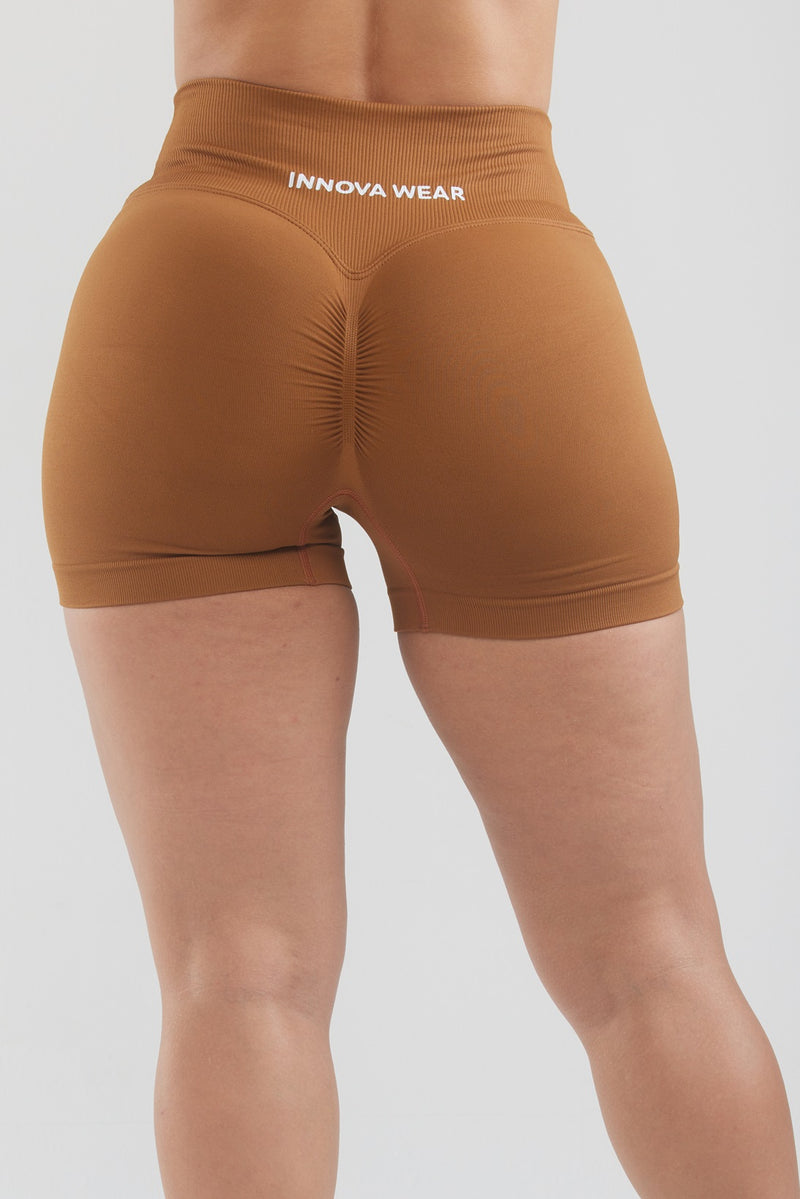 VIBE | SCUNCH BUTT V-WAIST SHORTS - RUST